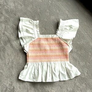 Marie Oliver Winnie Top Signature smocking bodice and peplum waist. NWT size M